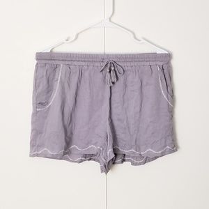 flowy lavender drawstring shorts with white trim